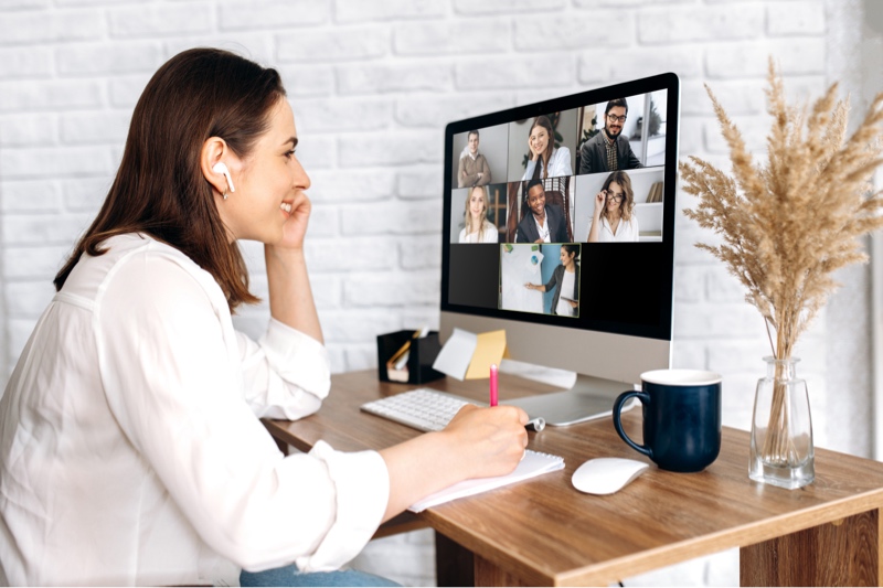 Woman attending webinar meeting online